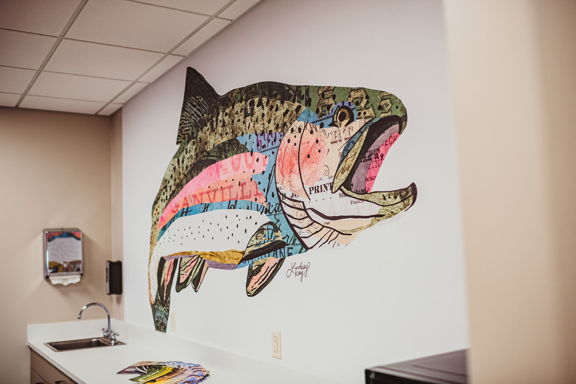 Wall art of fish with open mouth