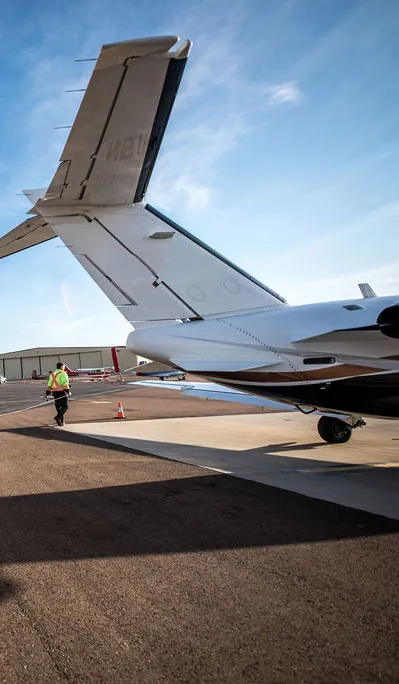 Tail of plane close up on airstrip